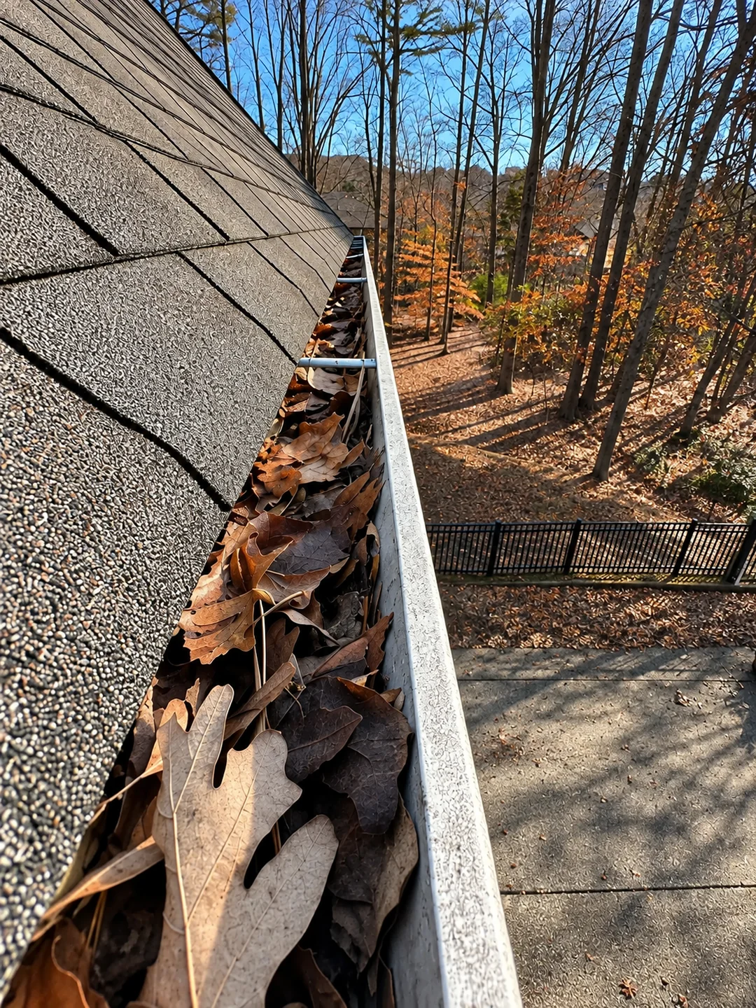 Clogged gutters before cleaning